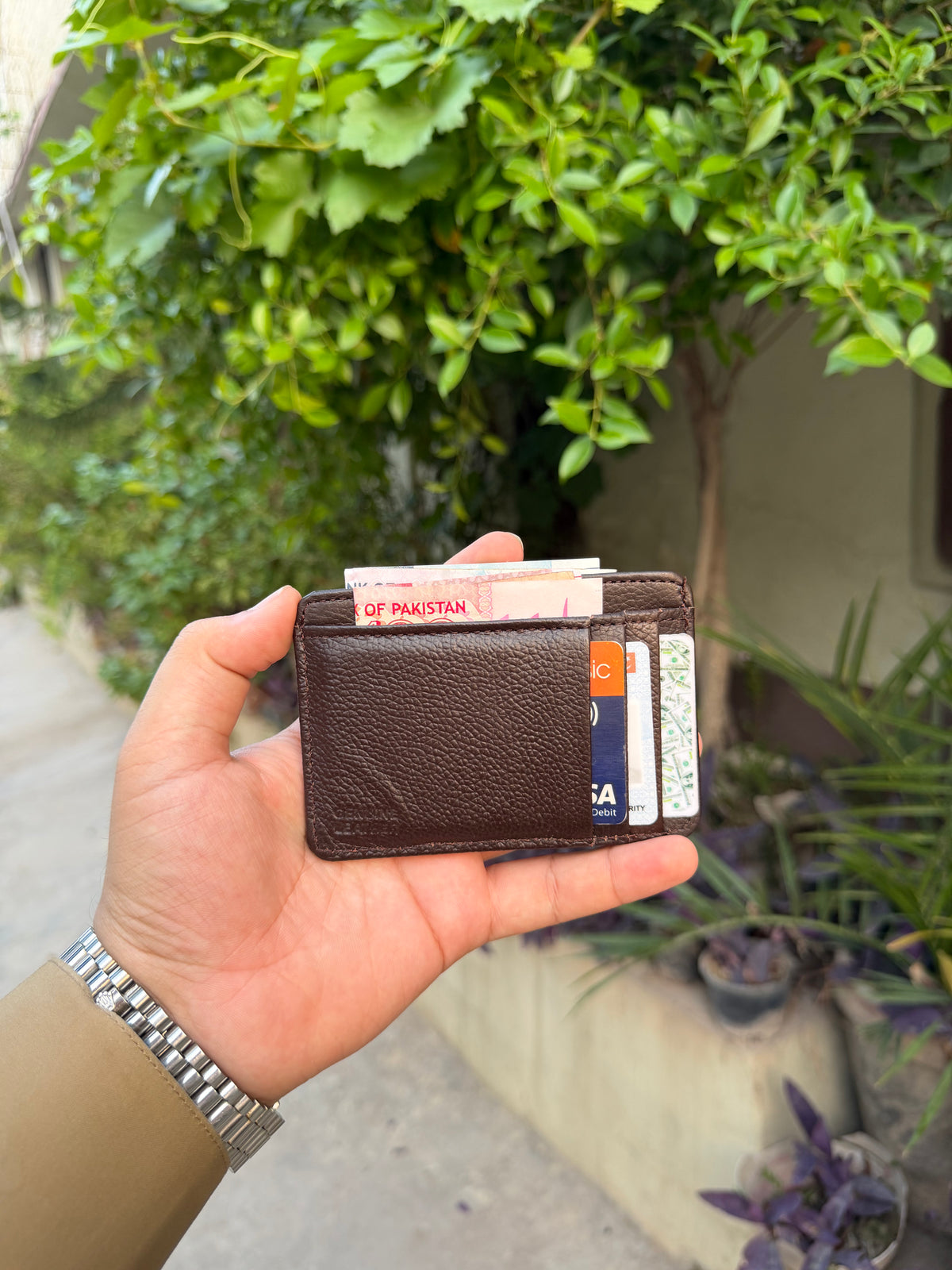 Dark Brown Slim Card Holder back view showing top cash slot and multiple cards loaded
