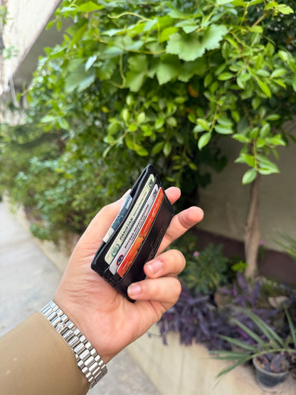 Black Slim Card Holder side view showing dual card slots fully loaded with 6 cards
