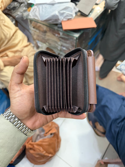 Bovi's Brown Accordion Wallet open interior showing 10+ card slots fanned out