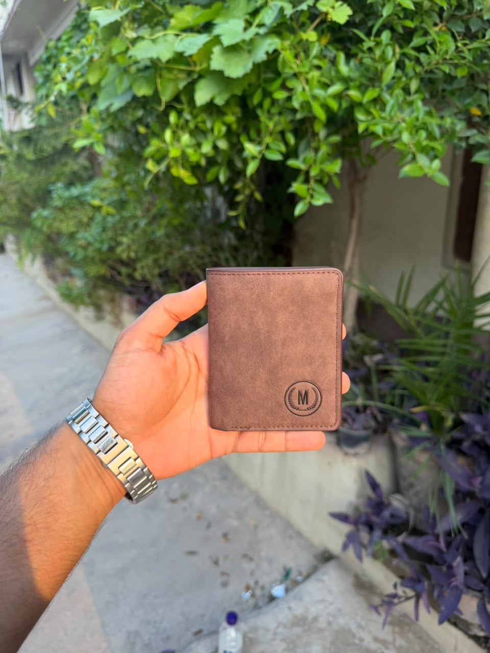 Brown Vintage Bifold Wallet outdoor front view showing distressed nubuck leather