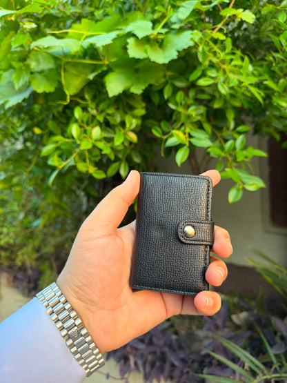 Black Pop-Up Card Wallet closed front view with bronze snap button